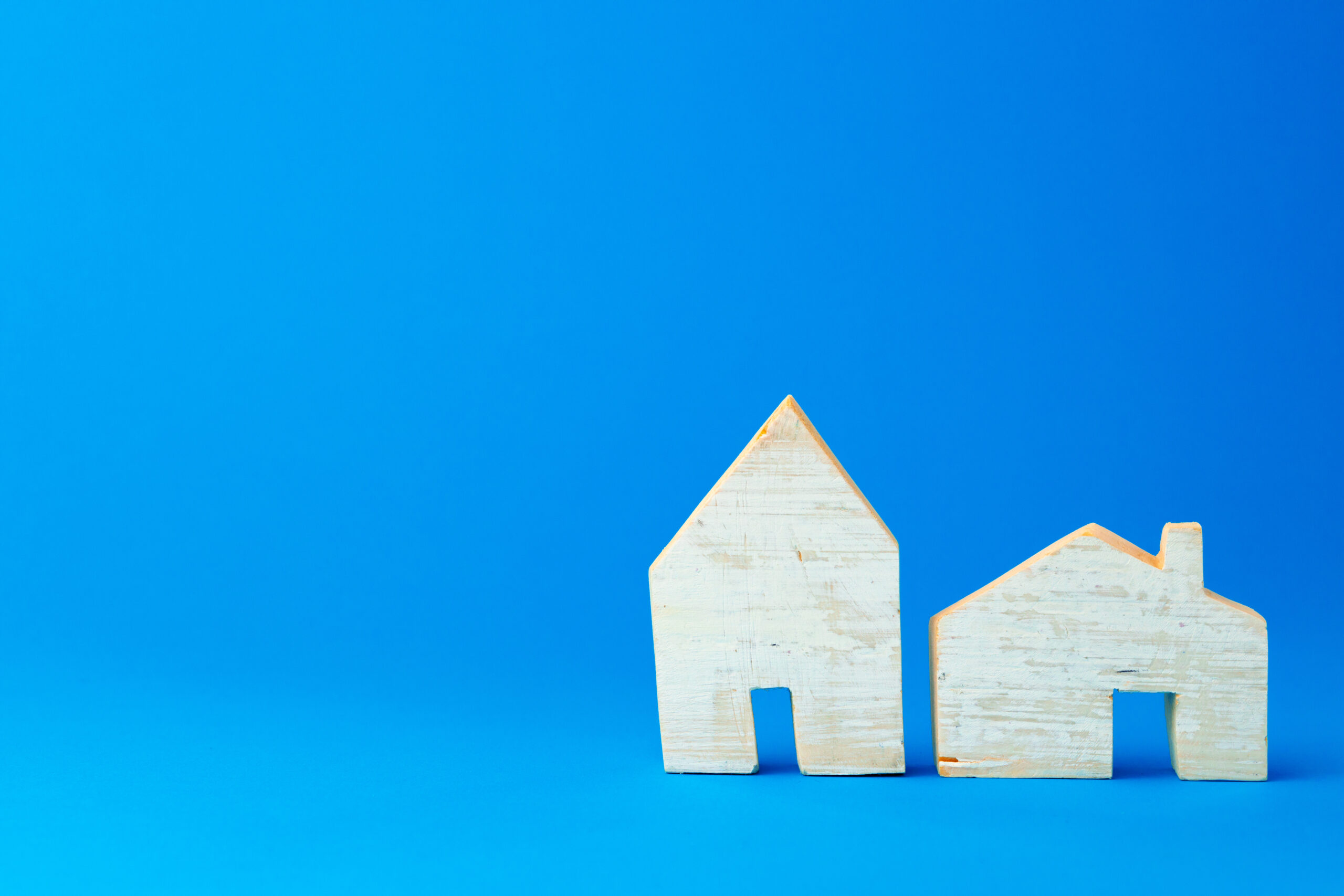 Little toy house model carved from wood